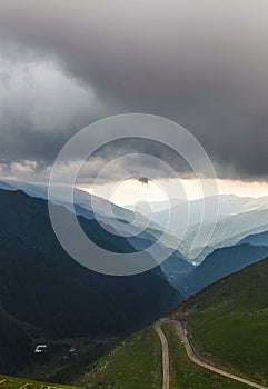 Cloudy sky over winding Transfagarasan road