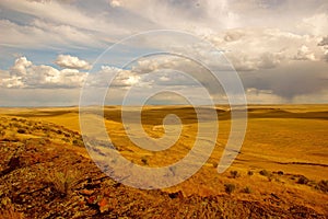 Cloudy sky over the yellow grass field in South of Bruno, Idaho, in the Owahee Wildlife Refuge