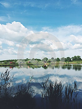 Cloudy sky reflected in the river