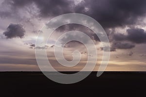 Cloudy sky with sundog