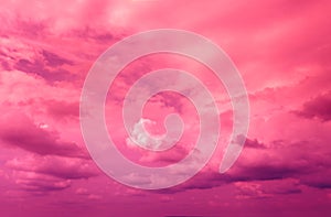 Cloudy sky at sunset. Magenta gradient color. Sky texture
