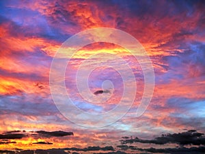 Cloudy Sunrise Sky in Blue, Red, Orange and Yellow Colors