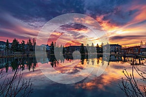 Cloudy Sunrise Sky Over A Park Lake