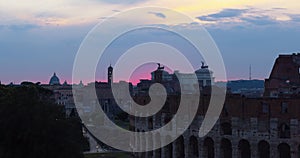 Cloudy Sunset over ancient Rome together with the Forums and the Colosseum