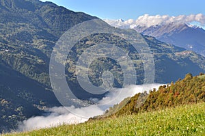 Cloudy valley in alps landscaping