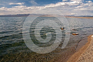 Cloudy view on a mountain lake. Mongolia