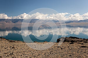 Cloudy view on a mountain lake. Mongolia mirror surface