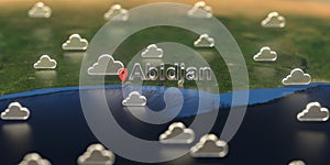 Cloudy weather icons near Abidjan city on the map, weather forecast related 3D rendering