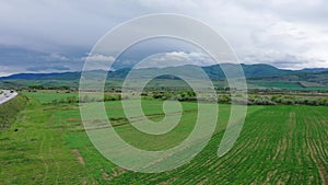 Cloudy weather in a mountain valley. Aerial view.