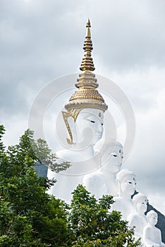 The cloudy and white five buddhas statue at Phra Thad Pha Son Kaew Temple. Khao-kho, Phetchaboon Distict, Thailand