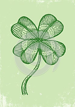 Clover on a green paper