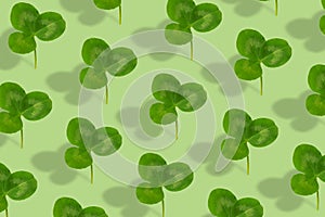 Clover leaf pattern on a green background. Abstract background for St. Patrick's Day