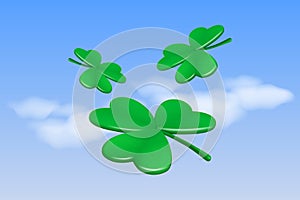 Clover leaves on the blue sky background