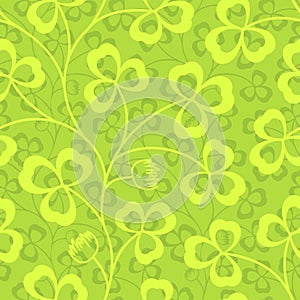 Clover leaves seamless vector pattern. St. Patrick`s Day green background. Shamrock wallpaper