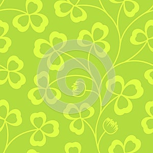 Clover leaves seamless vector pattern. St. Patrick`s Day green background. Shamrock wallpaper