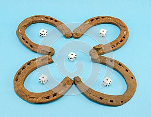 Clover retro horse shoes gamble dice on blue