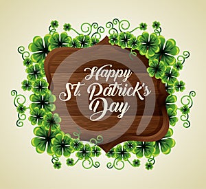Clovers plants with wood emblem to st patrick event