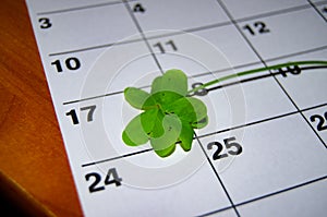 Clower leaf on top of the calendar marking 17 march st patricks day