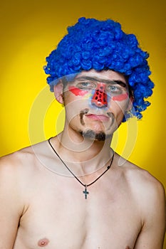 Clown in a blue wig