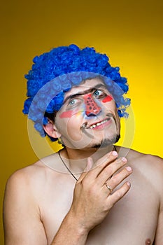Clown in a blue wig