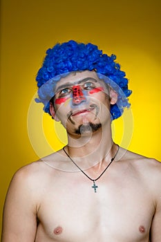 Clown in a blue wig