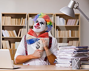 Clown businessman working in the office