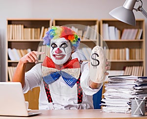 Clown businessman working in the office