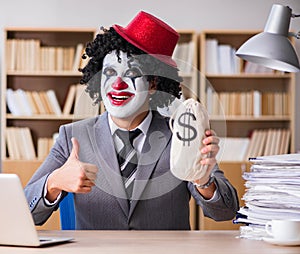 Clown businessman working in the office