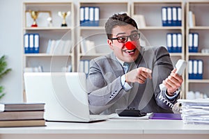 Clown businessman working in the office