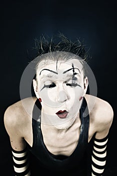 Clown with a dark makeup