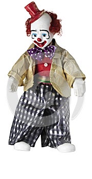 Clown doll with red top hat and spotted bow tie
