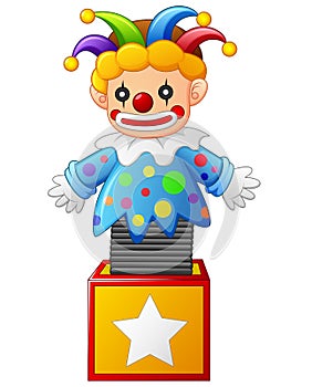 Clown jumping out from a box