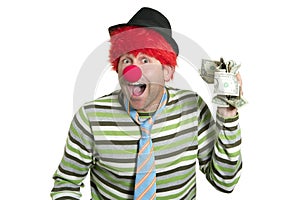 Clown with many dollar notes in hand