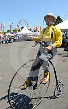 Clown on Penny Farthing Bicycle