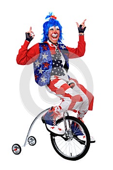 Clown Riding a Unicycle photo