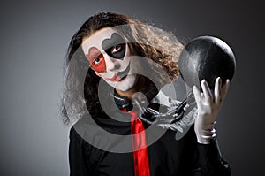 Clown with shackles