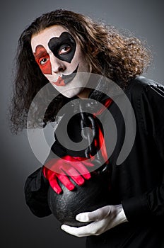 Clown with shackles