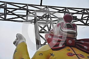 Clown statue at an amusement park photo
