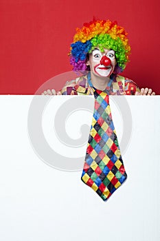 Clown with tie on blank white board