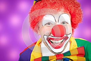 Clown with violet background