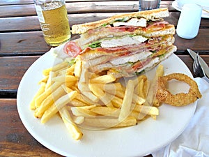 Club sandwich with french fries