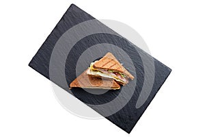 Club sandwich with ham, cheddar, cabbage and tomato isolated on white