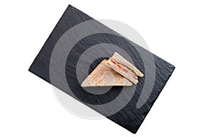 Club sandwich with veal ham, cheddar, cabbage and tomato isolated on white