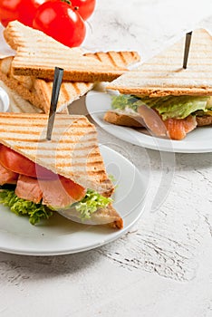 Club sandwiches with salmon