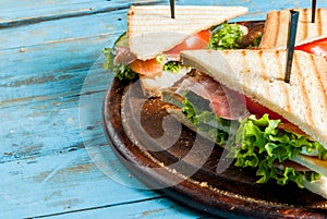 Club sandwiches with salmon