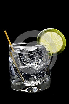 Club Soda or Gin/Vodka Tonic on a black background