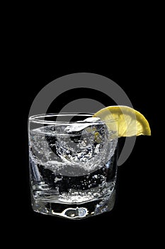 Club Soda or Gin / Vodka Tonic Cocktail on a black photo