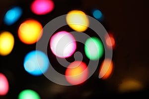 Clubbing light on black background photo