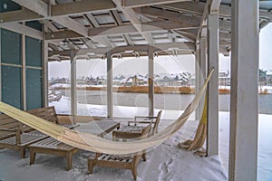 Clubhouse overlooking Oquirrh Lake in winter day