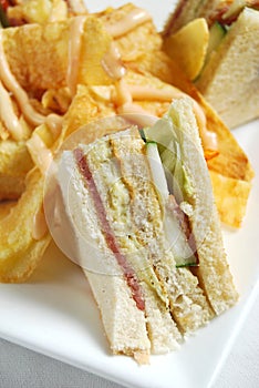 Clubhouse sandwich with potato chips